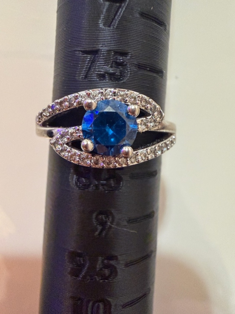 LaRaso & Co sterling silver engagement ring w a round-cut blue sapphire